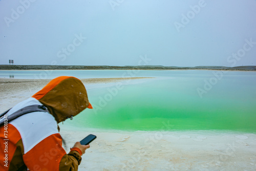 Dachaidan Emerald Lake, Hainan Mongolian and Tibetan Autonomous Prefecture, Qinghai Province - a lake in the saline-alkali land photo
