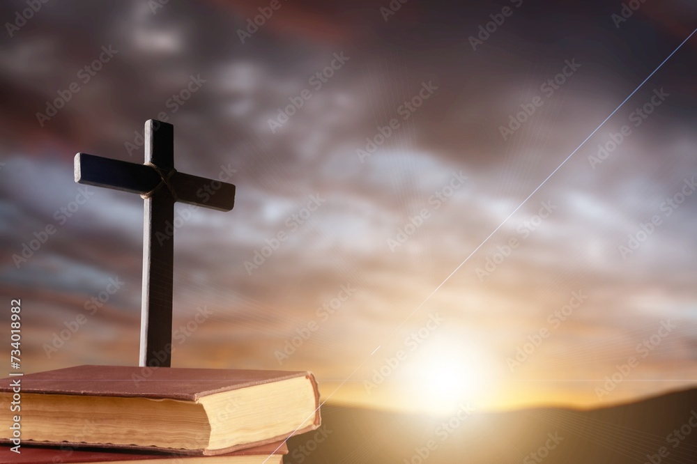 Bright sunlight, holly bible and cross Bright sunlight, holly bible and cross