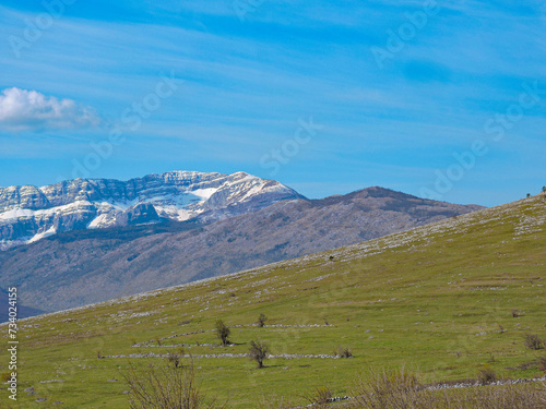Snowy mountains in the distance. © dzhumackic