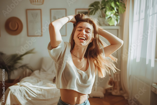 Hobby-Based Movement for Physical and Mental Health. Dance for mental health benefits, outlet for emotions. Young woman joyfully dancing alone at home