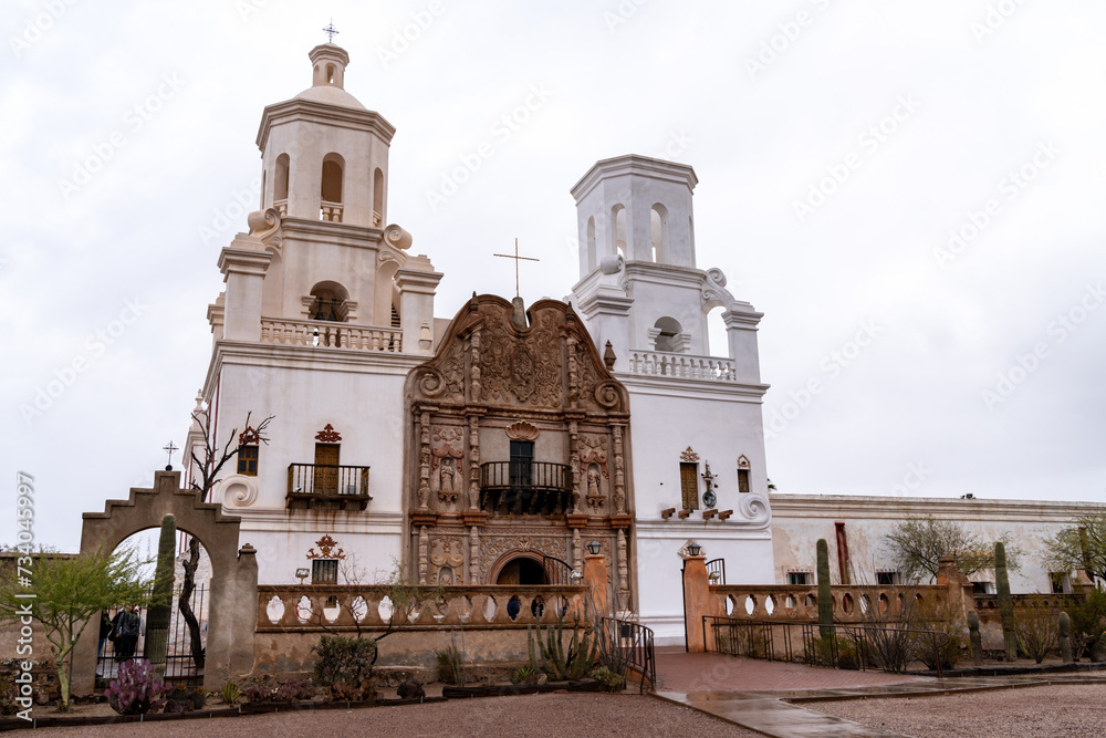 San Xavier del Bac Mission, Tohono O'odham Reservation, Tucson in Pima County, Arizona, on a cloudy day