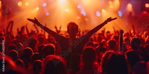 A Jubilant Concertgoer Dances With Infectious Enthusiasm In A Vibrant Crowd. Concept Energetic Concert Dancing, Infectious Enthusiasm, Vibrant Crowd, Jubilant Concertgoer