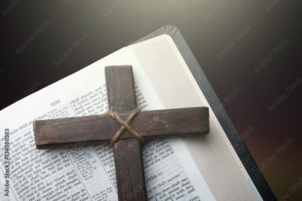 Religion Concept. Bible book with wooden Cross