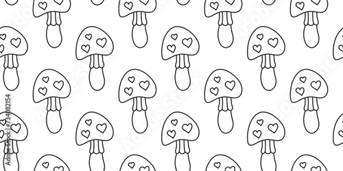 Seamless pattern with amanita fly agaric mushrooms and hearts.