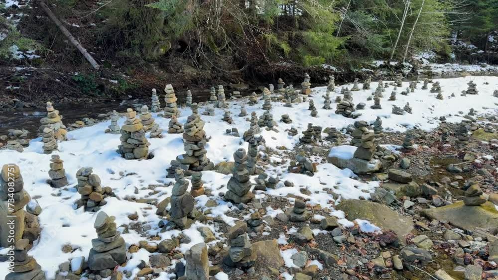 stone structures land art pyramids in the valley of the Zhenets river, Ukraine, Carpathians were left by tourists who really love these places on the way to the Guk waterfall stone structures land art pyramids in the valley of the Zhenets river, Ukraine, Carpathians were left by tourists who really love these places on the way to the Guk waterfall