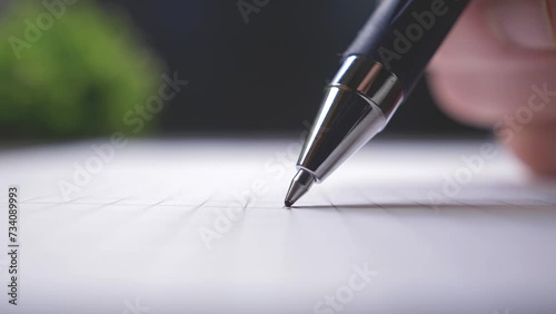 Fear of signing a document. Ballpoint pen close up photo