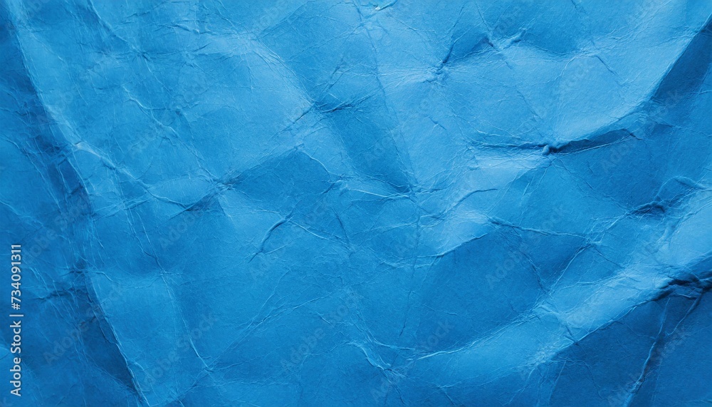 Bright blue crumbled paper texture background. Bright blue crumbled paper texture background.