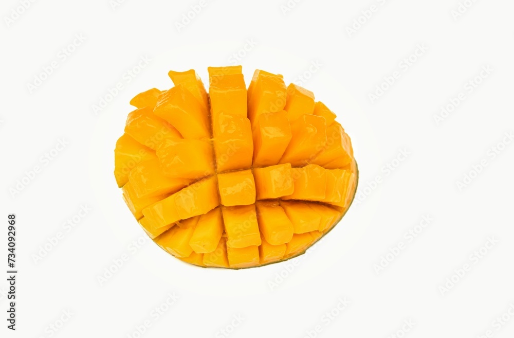 Closeup of Mango Cube Cut Isolated on White Background with Copy Space in Horizontal Orientation Closeup of Mango Cube Cut Isolated on White Background with Copy Space in Horizontal Orientation