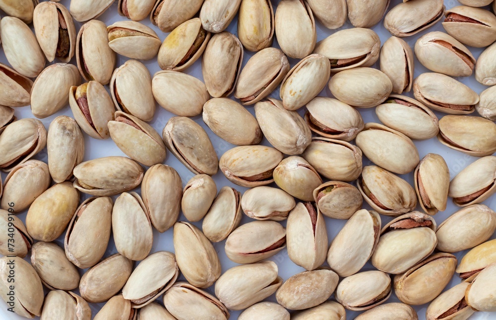 Pistachio Nut Background with Copy Space in Horizontal Orientation Pistachio Nut Background with Copy Space in Horizontal Orientation
