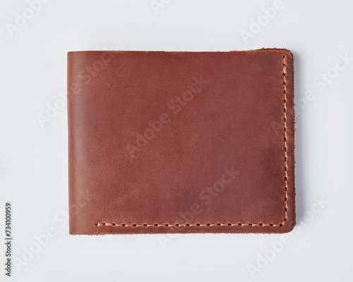 Personalized brown leather billfold wallet with embossing on white