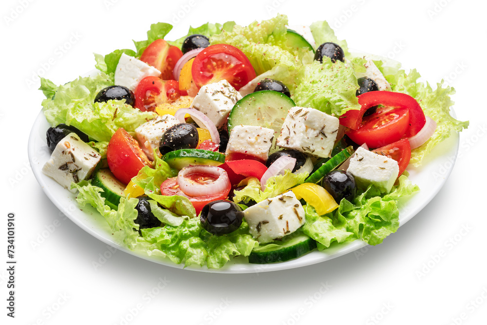 Greek salad on white plate isolated on white background. File contains clipping path.
