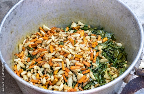 Fried Vegetabes Like Potato, Bean, Carrot, Lablab Bean in a Big Container