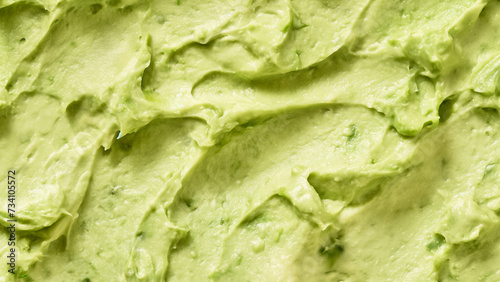 Guacamole sauce texture closeup. Mexican food. Guacamole. A seamless food texture. Use this texture in fabric and material printing, image backgrounds, posters and menus, invitations, collage