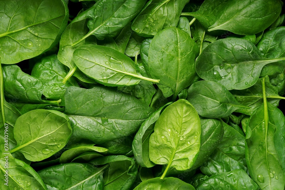 Fototapeta premium Spinach leaves background. Top view, flat lay