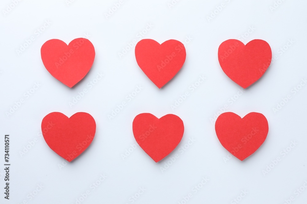 Paper hearts on white background, flat lay