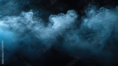 Smoke captured in a close-up shot on a black background. Perfect for adding a mysterious and dramatic touch to any design