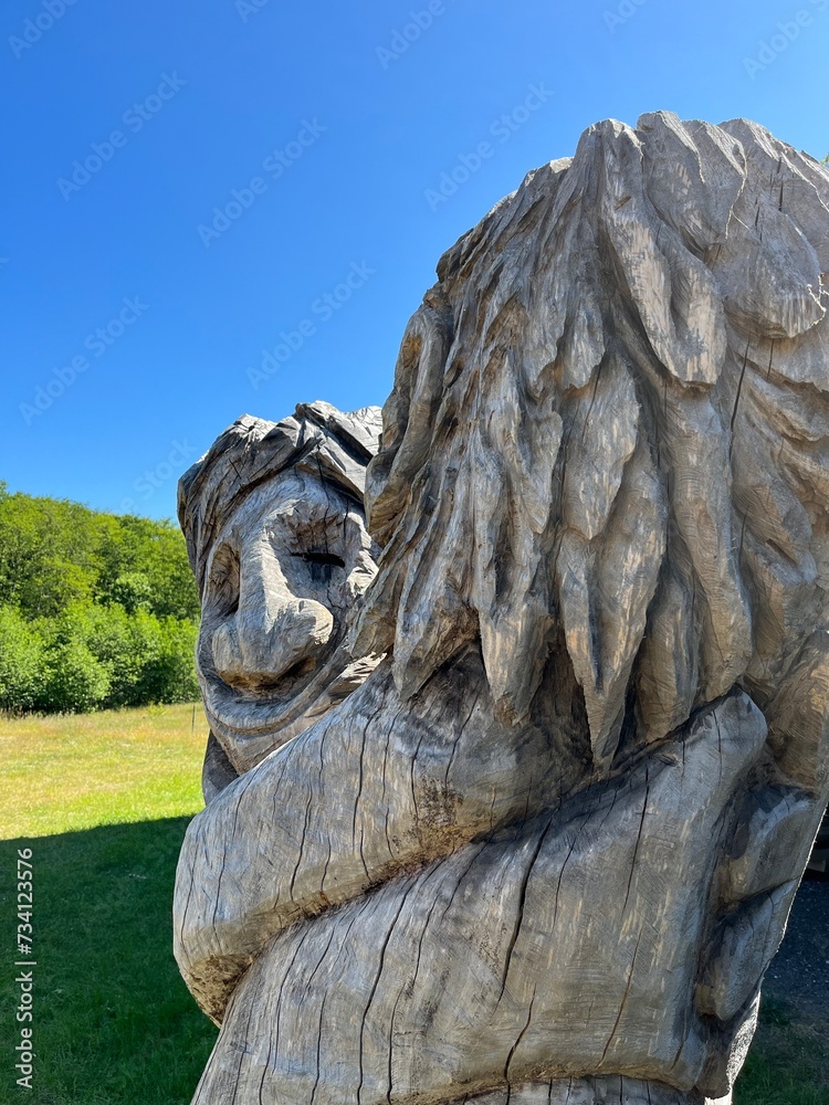 Fototapeta premium wooden sculpture of trolls