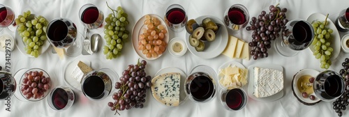 Elegant Wine Tasting Spread with Assorted Cheeses and Fruits © Nino Lavrenkova