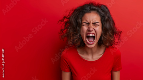 Latin American Woman Reflecting Anger and Frustration, Isolated on Solid Background - Copy Space Provided