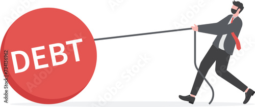 Businessman dragging a weight debt. business concept challenge and obstacle

