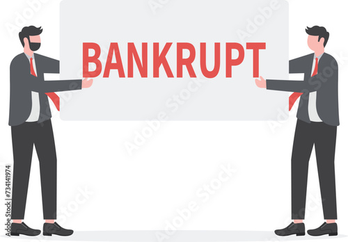 Businessmen hold placards with text-bankrupt. Financial crisis concept.

