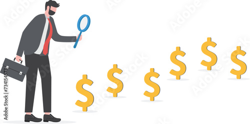Searching for investment opportunity, financial success or salary raise, inspect way to make profit and earning concept, curios businessman with magnifier inspect and follow money trail.


