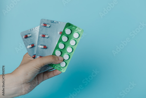 Female hand holding a pack ...