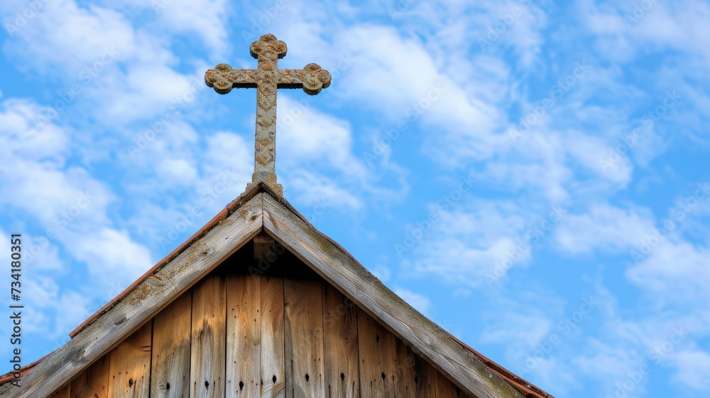 Divine silhouette - church cross against blue sky, religious symbolism