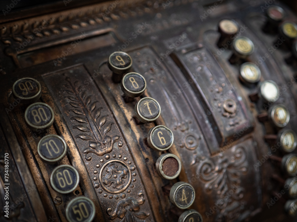 The old and vintage cash register .