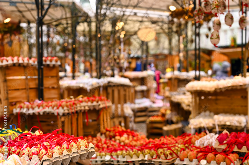 Fototapeta premium Traditional Easter market with colorful and painted easter eggs in Vienna Austria