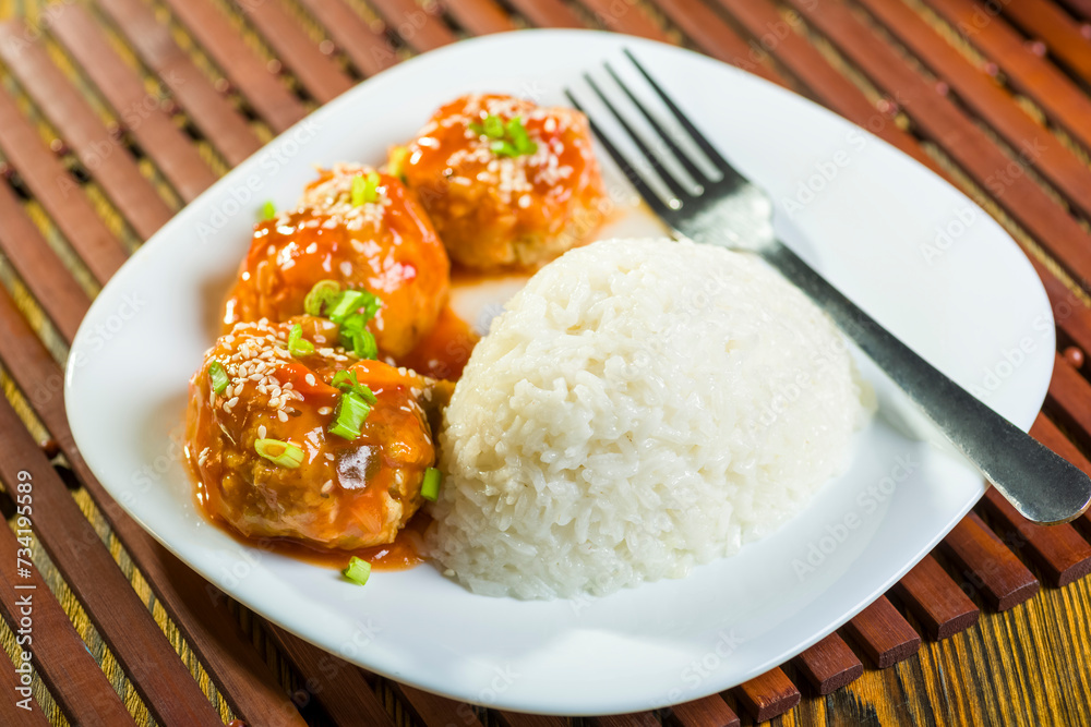 Chinese-style meatballs in sweet and sour sauce