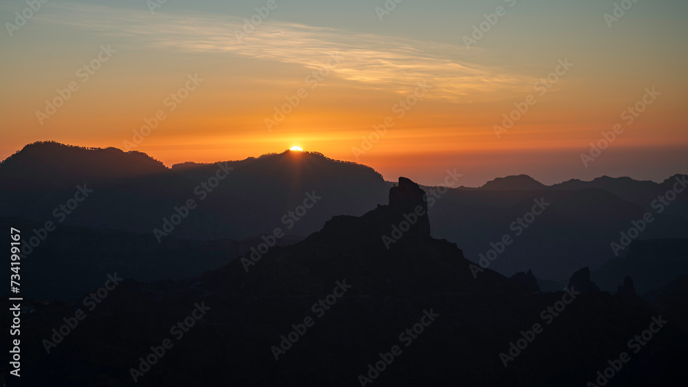 Sunset with the silhouette of Roque Bentayga and Roque Nublo on the island of Gran Canaria