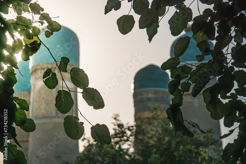 Exterior of Chor Minor Madrasah in the ancient city of Bukhara in Uzbekistan, oriental architecture at sunset in the evening