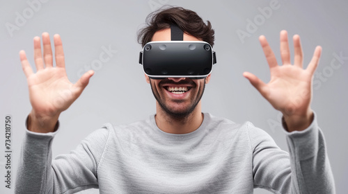  young man using vr glasses, virtual reality headset. VR, future, gadgets, technology concept. Modern technologies for entertainment.