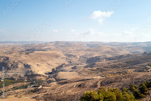 Overlooking the holy land from mount nebo, where Moses stood when talking to god, and curing plague from serpent staff. Jordan, Israel, Palestine and Gaza visible from this hill. Jesus' baptism site