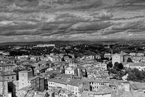 Siena Italy 09 30 2022: Old Medieval city in Tuscany in Europe. Art and culture. Tourists from all over the world for Piazza del Campo Palio Duomo Tower del Mangia and the oldest bank banco dei Paschi