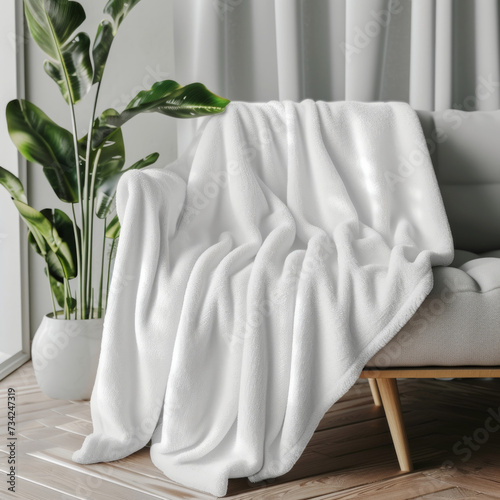 Clean and cozy white fleece blanket mockup, perfect for showcasing custom designs or branding for home decor products.