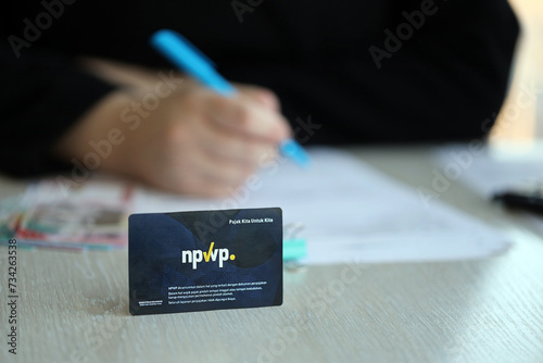 Indonesia NPWP new tax id Number card originally called Nomor Pokok Wajib Pajak. Used to carry out transactions related to taxation for Indonesian taxpayers. photo