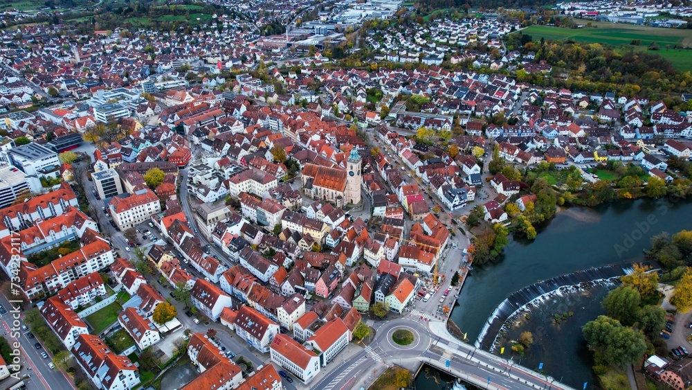 Aerial around the old town of the city Nürtingen in Germany on a afternoon in autumn.	
