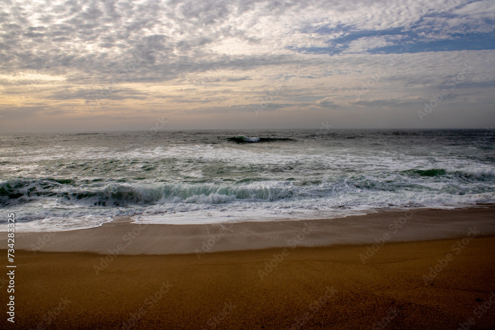 sunset on the beach , blue sea