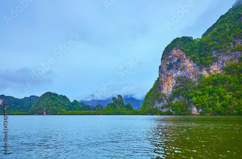 The steep rocks and tropic forests of Ao Phang Nga National Park, Thailand photo