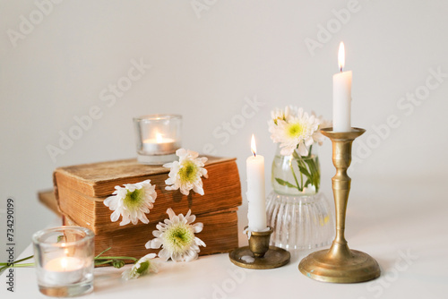 Old books and white flowers