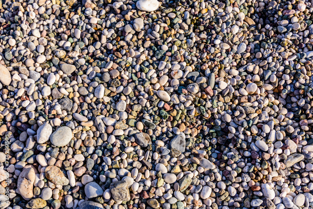 Texture of pebbles at the seaside. Natural background Texture of pebbles at the seaside. Natural background
