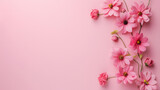 Harmonie Florale : L'éclat des couleurs estivales sur un fond rose vibrant
