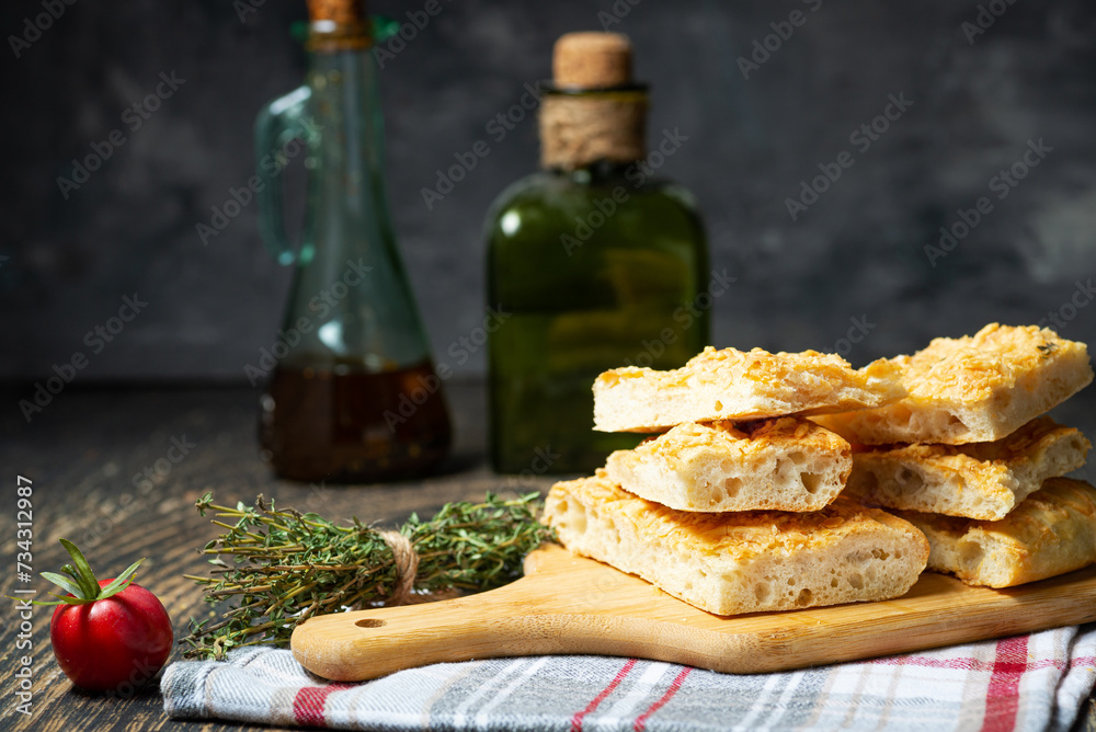 Traditional Italian focaccia bread with salt and olive oil. Homemade flat bread focaccia