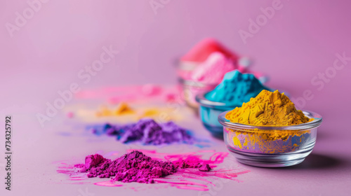 Coloured pigments in glass containers. Colourful Holi celebration concept