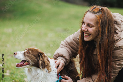 Woman With a Dog in a Park
