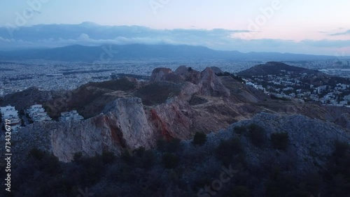 This footage is made with a drone, from the neighbourhood called Galatsi, also known as Tourkovounia, a small hill in the center of Athens. This footage is made early in the morning, at winter photo