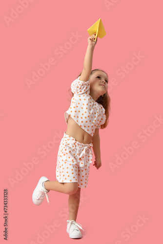 Cute little girl with paper...