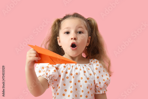 Cute little girl with paper...